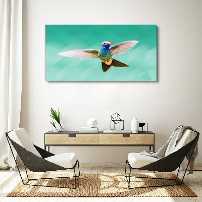 Hummingbird in blue background Canvas wall art