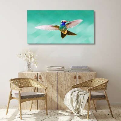 Hummingbird in blue background Canvas wall art
