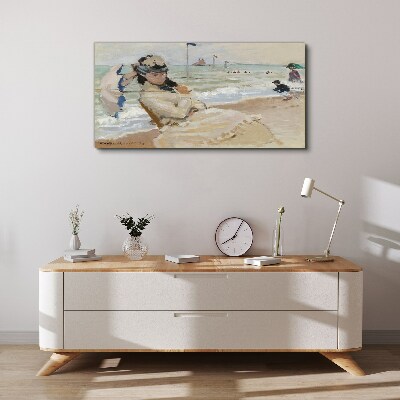 Woman on the beach with an umbrella Canvas wall art