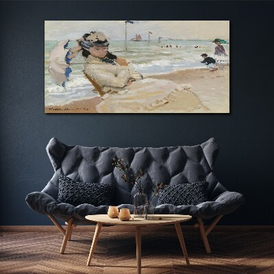 Woman on the beach with an umbrella Canvas wall art