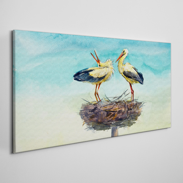 Storks on a nest in the blue Print on canvas