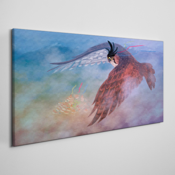 Flight of a bird of prey in the clouds Print on canvas