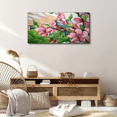 A bird against a background of spring flowers Canvas wall art