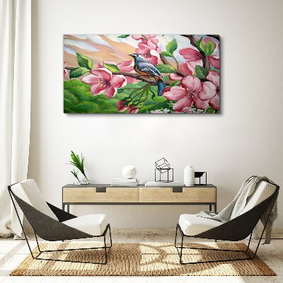 A bird against a background of spring flowers Canvas wall art