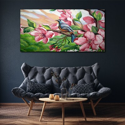 A bird against a background of spring flowers Canvas wall art