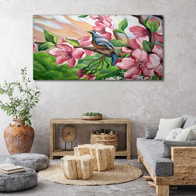 A bird against a background of spring flowers Canvas wall art