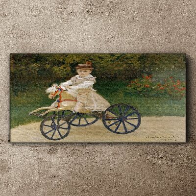 Child on a ride-on Print on canvas