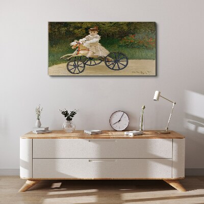 Child on a ride-on Print on canvas