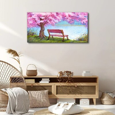 Spring peace under the blossoming cherry tree Canvas wall art