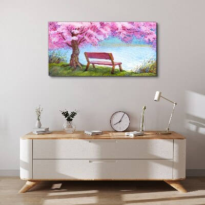 Spring peace under the blossoming cherry tree Canvas wall art