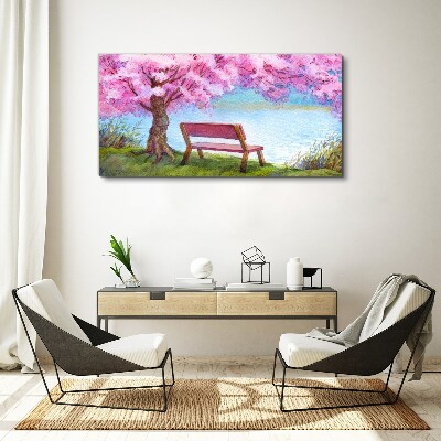 Spring peace under the blossoming cherry tree Canvas wall art