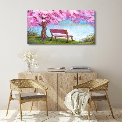 Spring peace under the blossoming cherry tree Canvas wall art