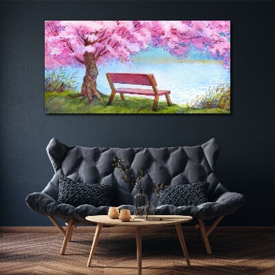 Spring peace under the blossoming cherry tree Canvas wall art