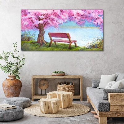 Spring peace under the blossoming cherry tree Canvas wall art