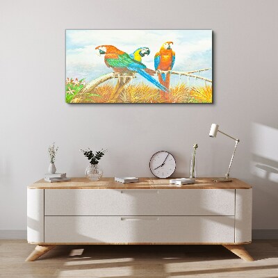 Tropical parrots on a branch Canvas wall art