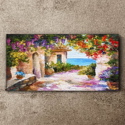 The flower alley of a seaside village Canvas wall art