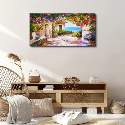 The flower alley of a seaside village Canvas wall art
