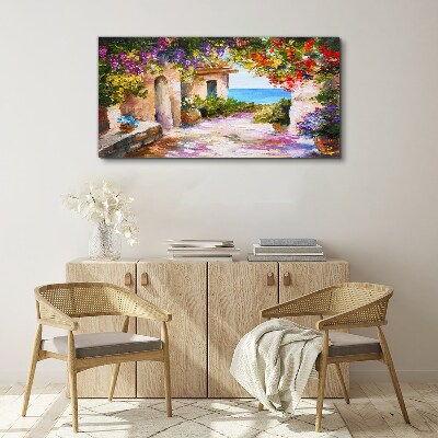 The flower alley of a seaside village Canvas wall art