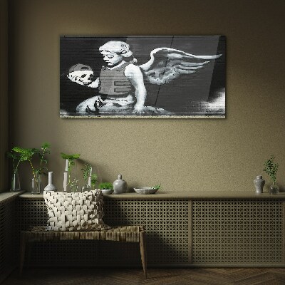Angel with a skull in the background of graffiti Glass art print