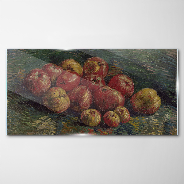 Apples on a green background Glass art print