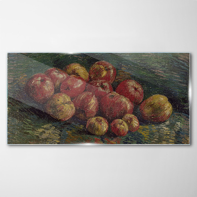 Apples on a green background Glass art print