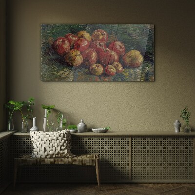 Apples on a green background Glass art print