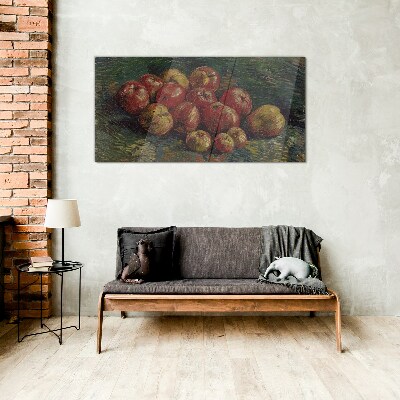 Apples on a green background Glass art print