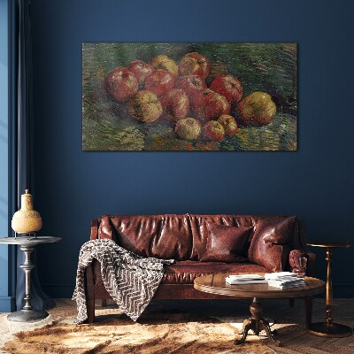 Apples on a green background Glass art print