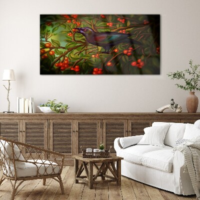 A bird on a fruit branch in the background Glass art print