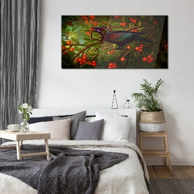 A bird on a fruit branch in the background Glass art print