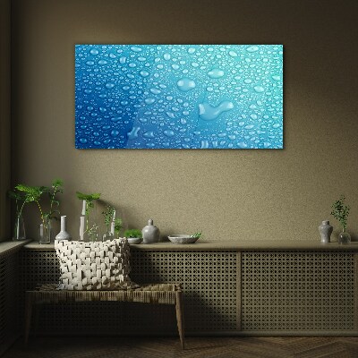 Water drops on a blue background Wall art on glass