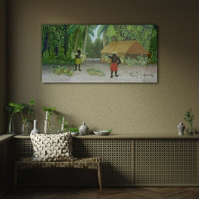 Banana harvest in a tropical landscape Glass art print