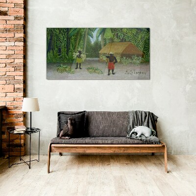 Banana harvest in a tropical landscape Glass art print