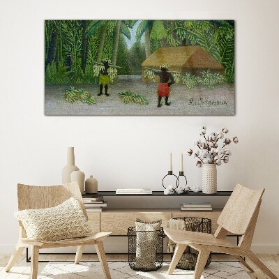 Banana harvest in a tropical landscape Glass art print