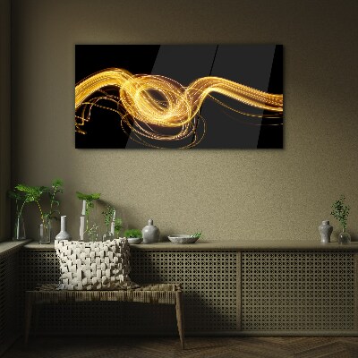 Golden streaks of light on black Glass art print