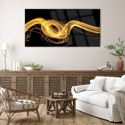 Golden streaks of light on black Glass art print