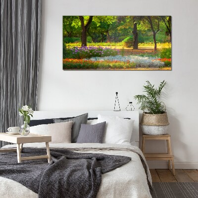 A flower paradise in a sunny garden Glass art print