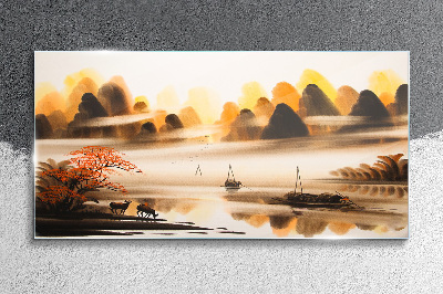 A peaceful landscape with mountains and water Wall art on glass