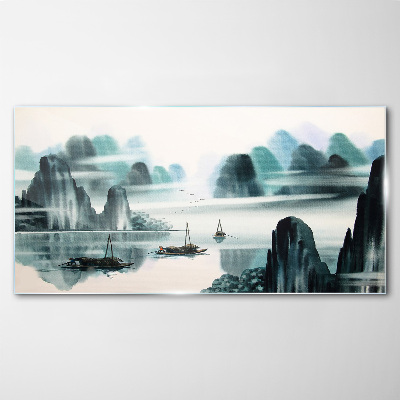 A peaceful lake in a mountain landscape Glass art print