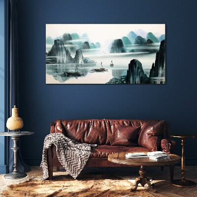 A peaceful lake in a mountain landscape Glass art print