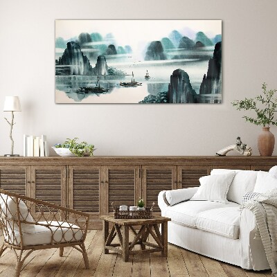 A peaceful lake in a mountain landscape Glass art print