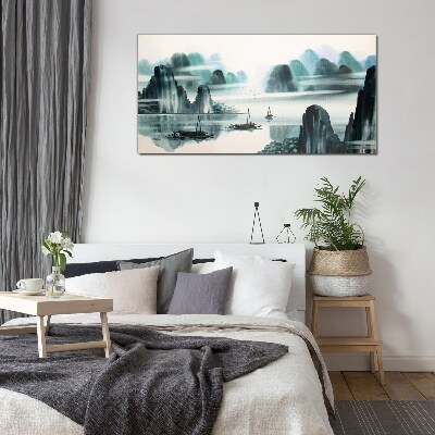 A peaceful lake in a mountain landscape Glass art print