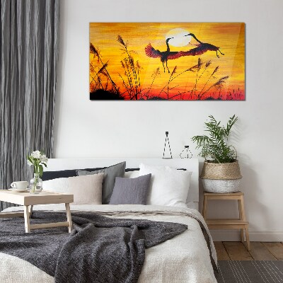 Dancing cranes at sunset Glass art print