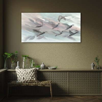 Flight of birds in a pastel aura Wall art on glass