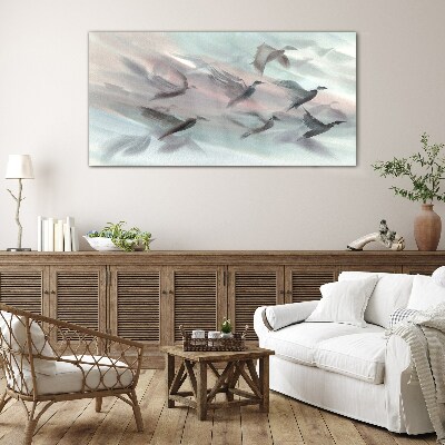 Flight of birds in a pastel aura Wall art on glass