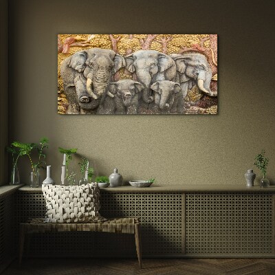 Family of elephants in a forest landscape Wall art on glass