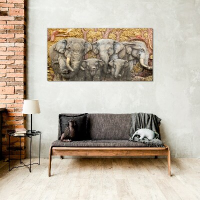 Family of elephants in a forest landscape Wall art on glass