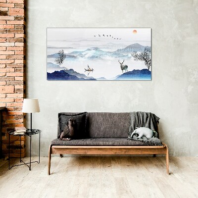 A peaceful mountain landscape with a deer Glass art print