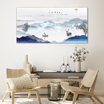 A peaceful mountain landscape with a deer Glass art print