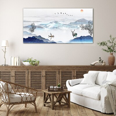 A peaceful mountain landscape with a deer Glass art print